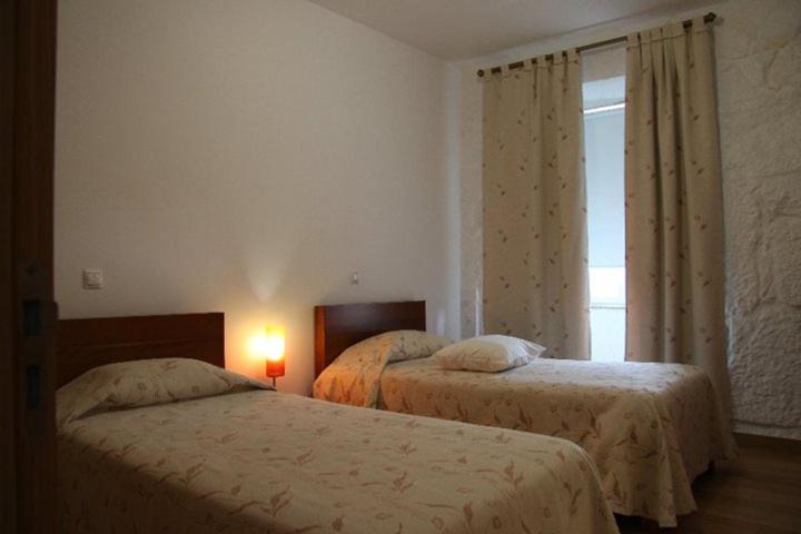 Descubra a Casa da Quinta da Calçada: Um Refúgio de Conforto e Elegância - Imagem 18