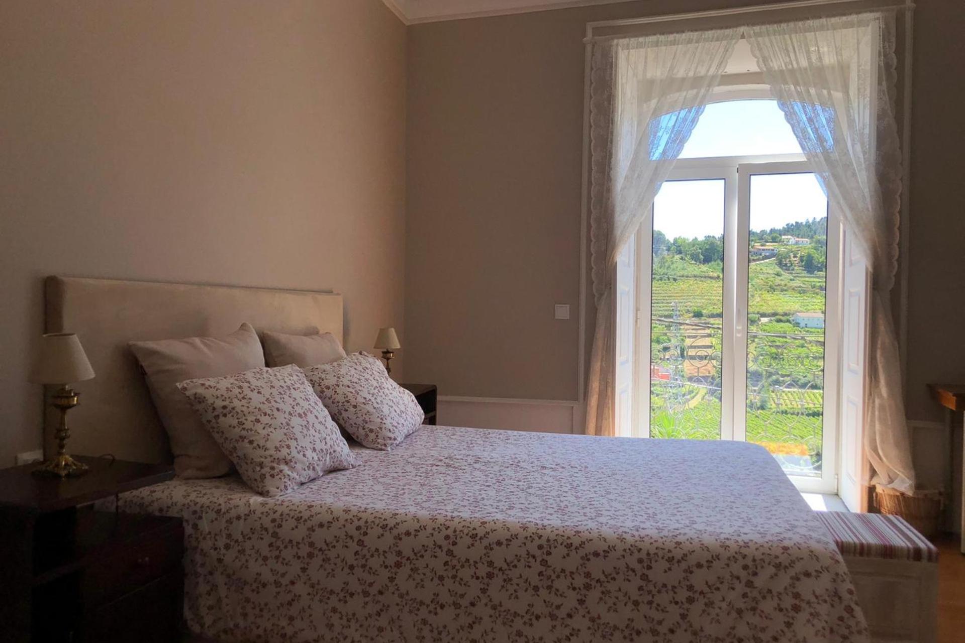 Descubra a Casa de Carrapatelo: Um Refúgio de Conforto e Confiança - Imagem 10