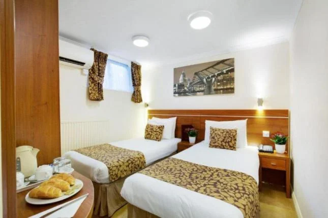 Experience Luxury at Queens Park Hotel - Image 16